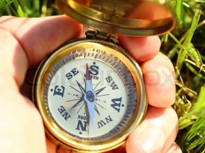 7053340-golden-compass-in-male-hand